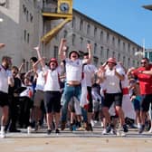 England fans celebrate their side's first goal at Millennium Square in Leeds watching the UEFA Euro 2024 Group C match between Denmark and England.