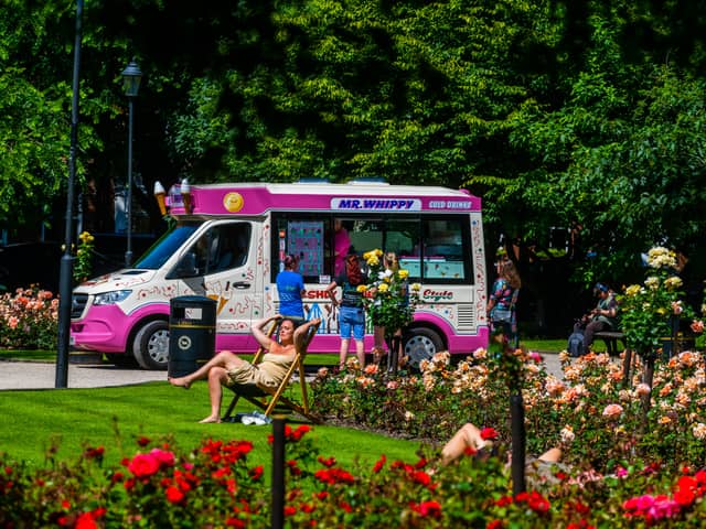 People enjoy the sun in Park Square as the UK Health Security Agency issued a yellow heat health alert for most of England.