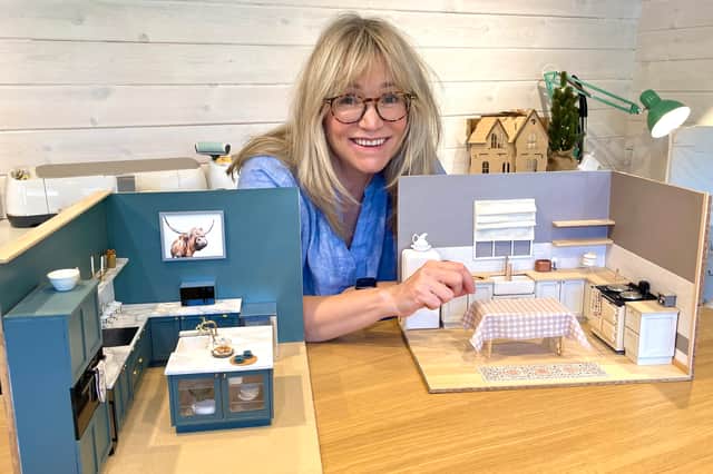 Beth Krum with her doll house creations.