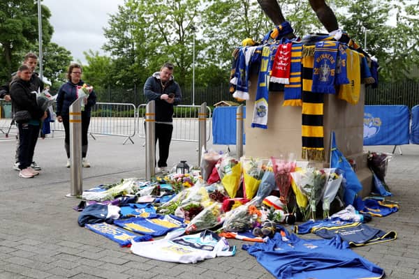 Fans pay tribute outside Headingley Stadium in Leeds to rugby league legend Rob Burrow following his death aged 41.