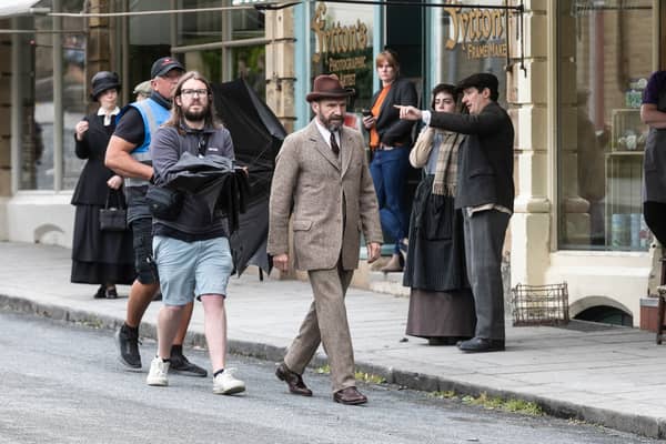 Ralph Fiennes pictured filming in Saltaire, West Yorkshire, for The Choral.
