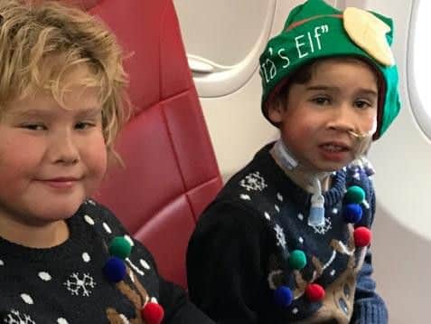 Brothers Harvey and George on the Santa flight.