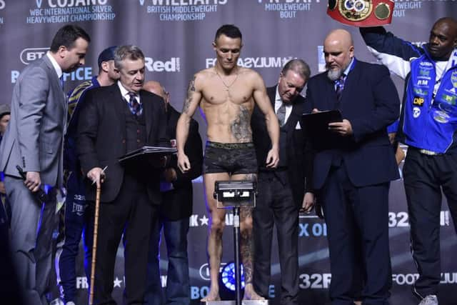 Josh Warrington weighs in for his fight with Carl Frampton.