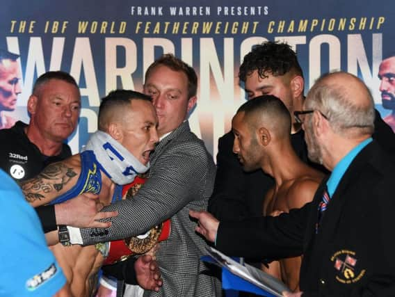 NO LOVE LOST: Josh Warrington and Kid Galahad come face to face at Friday's white-hot weigh-in at Leeds City Museum. Picture by Jonathan Gawthorpe.