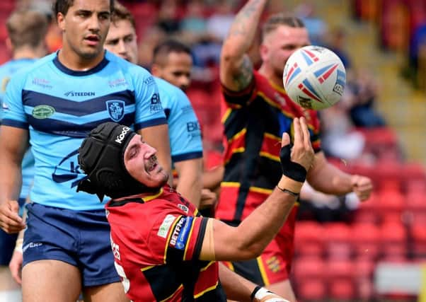 Michael Knowles celebrates scoring for Dewsbury against Featherstone last weekend.