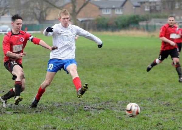 Action from Saville Armsv Clifton Rangers in Heavy Woollen League Division 2.