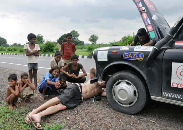 Running repairs to the cab in India.