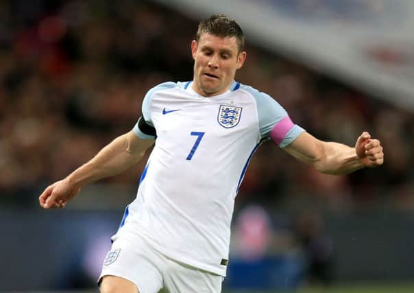 James Milner in action against Holland.