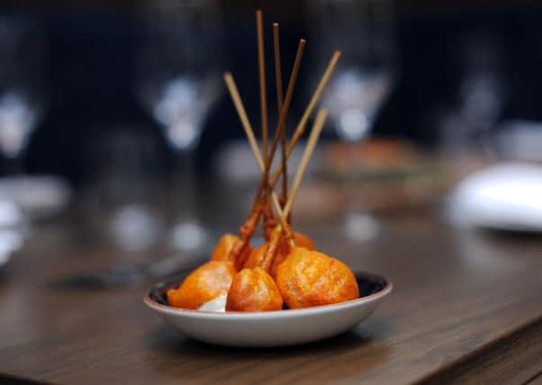 Chorizo lollipops at Iberica. Pictures: Simon Hulme.