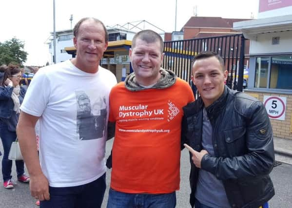 Martin Hywood with Simon Grayson and Josh Warrington.