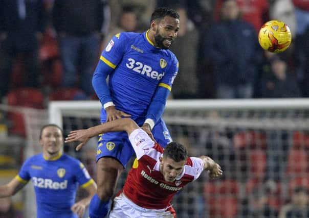 Kyle Bartley beats Dominic Ball to a high ball.