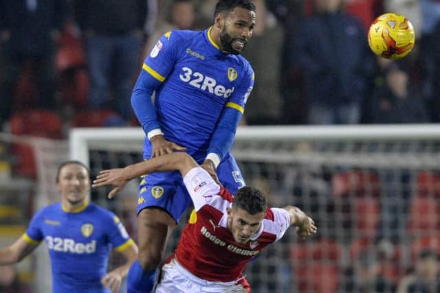 Kyle Bartley beats Dominic Ball to a high ball.