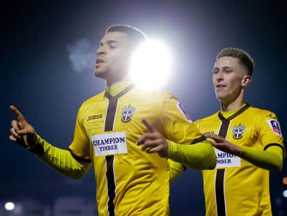 Sutton United's Maxime Biamou celebrates scoring against AFC Wimbledon (Photo: PA)