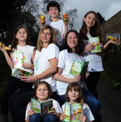 Bardsey mums Hayley Dodsworth and Donna Harrison, right, launch their book  Emma Bright and The Super Food Fight, to encourage fussy eating children to try new foods. Pictured with children clockwise from left, Oliva Dodsworth, Peter Harrison, Emma Dodsworth, Lyla Harrison and Anna Dodsworth.
2nd February 2017.
Picture : Jonathan Gawthorpe