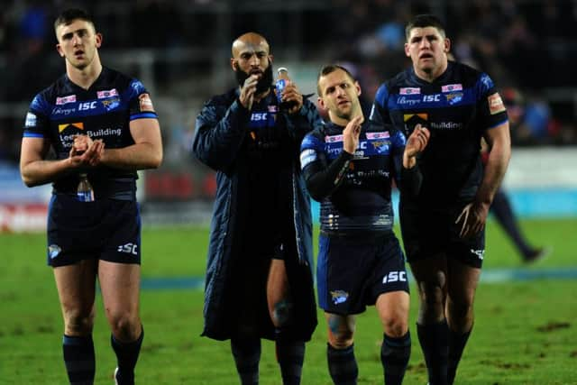 Leeds Rhinos players acknowledge the fans at the end of the St Helens game.