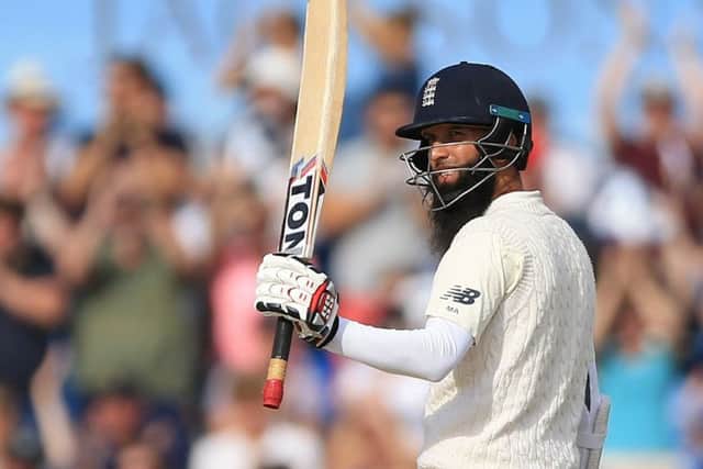England's Moeen Ali reaches his half century against West Indies at Headingley on Monday. Picture: Nigel French/PA