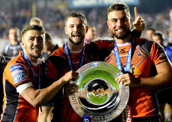 Castleford's players Greg Minikin, Zak Hardaker and Mike McMeeken,celebrate the League Leaders Shield.