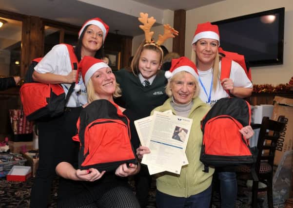 SUCCESS: Homeless Street Angels hosted a bag-packing event to help the homeless this Christmas.