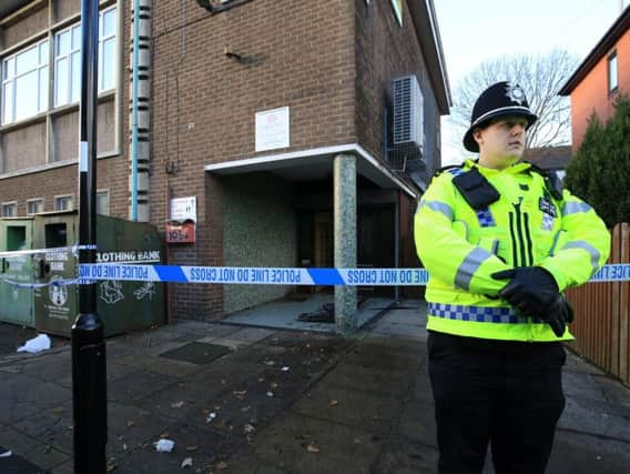 Police outside the community centre.