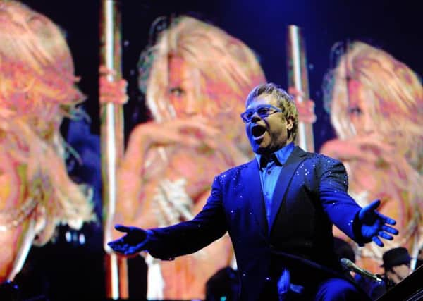 4th September 2013. Sir Elton John performs live on stage at the opening night of the First Direct Arena in Leeds.