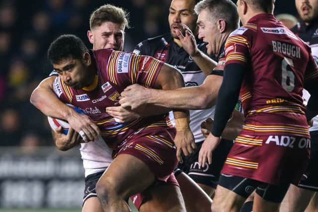 Suspended Widnes co-captain Chris Houston, right, and re-signed Huddersfield Giants' Sebastine Ikahihifo. PIC: Alex Whitehead/SWpix.com