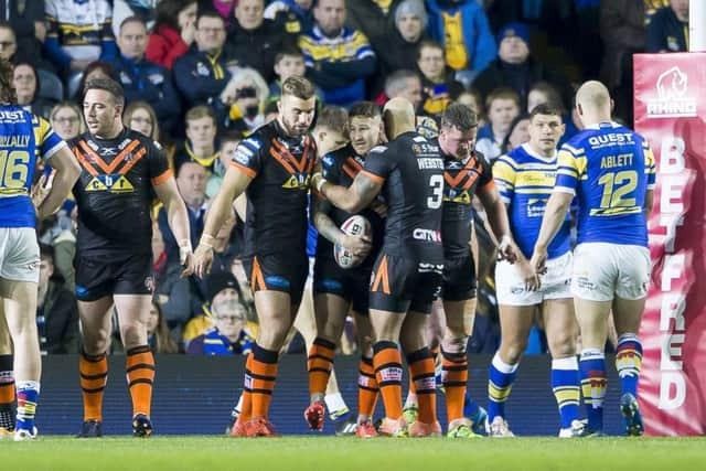 Castleford celebrate Jamie Ellis's try.