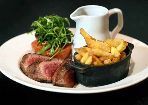 Butchers Steak with thin chips.
 PIC: Jonathan Gawthorpe