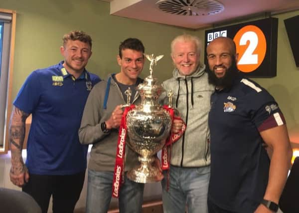 Josh Charnley, Vassos Alexander, Chris Evans and Jamie Jones-Buchanan with the Challenge Cup.